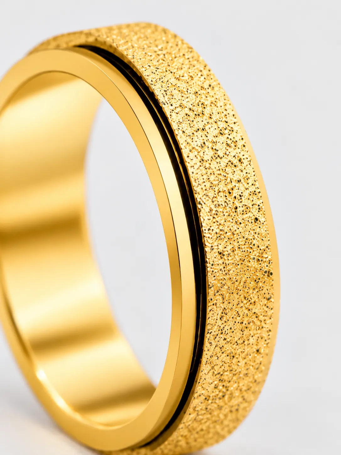 Bague tournante texturée sable doré